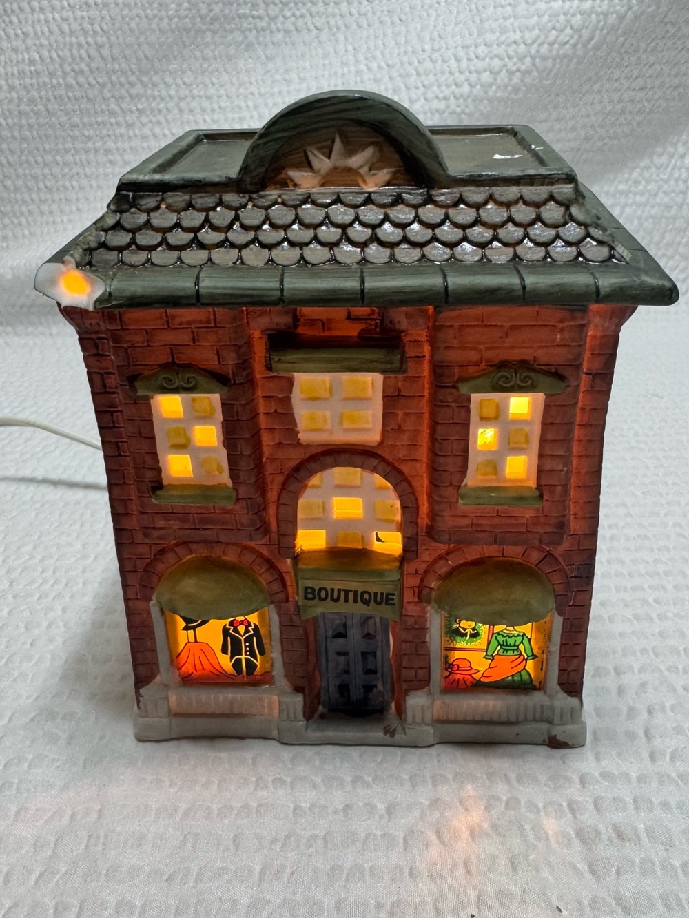 Vintage boutique  lighted boutique building from a holiday village set